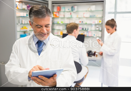 To use this stock image in your creative project, please select the size you need over to the right and click the "Add to Cart" button.
Your downloaded image will come with the Cutcaster watermark removed so don’t worry about the watermark you see on this page. Senior pharmacist using tablet pc stock photo, Senior pharmacist using tablet pc at the hospital pharmacy by Wavebreak Media