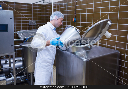 To use this stock image in your creative project, please select the size you need over to the right and click the "Add to Cart" button.
Your downloaded image will come with the Cutcaster watermark removed so don’t worry about the watermark you see on this page. Smiling man in lab coat pouring something on the machine stock photo, Smiling man in lab coat pouring something on the machine in the factory by Wavebreak Media