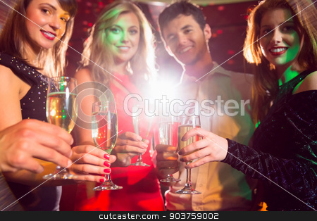 To use this stock image in your creative project, please select the size you need over to the right and click the "Add to Cart" button.
Your downloaded image will come with the Cutcaster watermark removed so don’t worry about the watermark you see on this page. Happy friends on a night out together stock photo, Happy friends on a night out together at the nightclub by Wavebreak Media