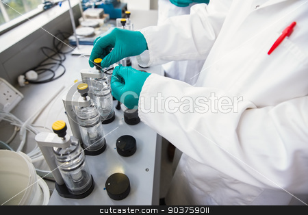 To use this stock image in your creative project, please select the size you need over to the right and click the "Add to Cart" button.
Your downloaded image will come with the Cutcaster watermark removed so don’t worry about the watermark you see on this page. Team of scientists working together stock photo, Team of scientists working together at the laboratory by Wavebreak Media