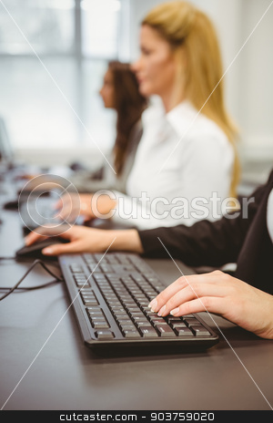 To use this stock image in your creative project, please select the size you need over to the right and click the "Add to Cart" button.
Your downloaded image will come with the Cutcaster watermark removed so don’t worry about the watermark you see on this page. Close up of a businesswoman typing on keyboard stock photo, Close up of a businesswoman typing on keyboard in the office by Wavebreak Media