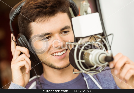 To use this stock image in your creative project, please select the size you need over to the right and click the "Add to Cart" button.
Your downloaded image will come with the Cutcaster watermark removed so don’t worry about the watermark you see on this page. Portrait of an university student recording audio stock photo, Portrait of an university student recording audio in a studio of a radio by Wavebreak Media