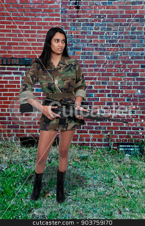 To use this stock image in your creative project, please select the size you need over to the right and click the "Add to Cart" button.
Your downloaded image will come with the Cutcaster watermark removed so don’t worry about the watermark you see on this page. Woman Soldier stock photo, Beautiful young woman soldier with a M16 rifle by Robert Byron