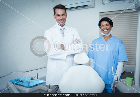 To use this stock image in your creative project, please select the size you need over to the right and click the "Add to Cart" button.
Your downloaded image will come with the Cutcaster watermark removed so don’t worry about the watermark you see on this page. Portrait of smiling dentists stock photo, Portrait of smiling male and female dentists by Wavebreak Media