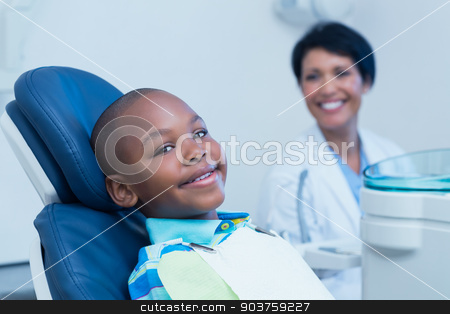 To use this stock image in your creative project, please select the size you need over to the right and click the "Add to Cart" button.
Your downloaded image will come with the Cutcaster watermark removed so don’t worry about the watermark you see on this page. Smiling boy waiting for a dental exam stock photo, Portrait of smiling boy waiting for a dental exam by Wavebreak Media