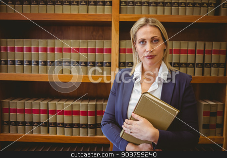 To use this stock image in your creative project, please select the size you need over to the right and click the "Add to Cart" button.
Your downloaded image will come with the Cutcaster watermark removed so don’t worry about the watermark you see on this page. Portrait of a librarian posing and holding a book stock photo, Portrait of a librarian posing and holding a book in library by Wavebreak Media