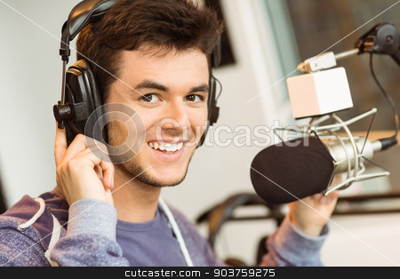 To use this stock image in your creative project, please select the size you need over to the right and click the "Add to Cart" button.
Your downloaded image will come with the Cutcaster watermark removed so don’t worry about the watermark you see on this page. Portrait of an university student recording audio stock photo, Portrait of an university student recording audio in a studio of a radio by Wavebreak Media