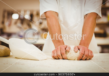 To use this stock image in your creative project, please select the size you need over to the right and click the "Add to Cart" button.
Your downloaded image will come with the Cutcaster watermark removed so don’t worry about the watermark you see on this page. Baker kneading dough at a counter stock photo, Baker kneading dough at a counter in a commercial kitchen by Wavebreak Media
