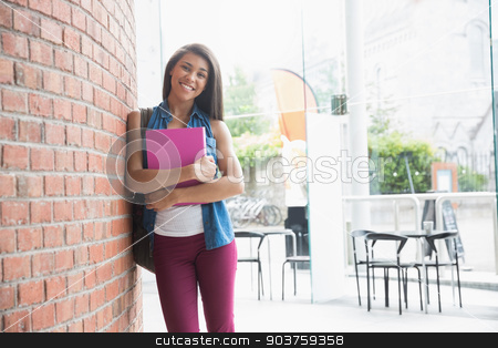 To use this stock image in your creative project, please select the size you need over to the right and click the "Add to Cart" button.
Your downloaded image will come with the Cutcaster watermark removed so don’t worry about the watermark you see on this page. Pretty student smiling and holding notepads stock photo, Pretty student smiling and holding notepads at the university by Wavebreak Media