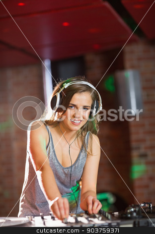 To use this stock image in your creative project, please select the size you need over to the right and click the "Add to Cart" button.
Your downloaded image will come with the Cutcaster watermark removed so don’t worry about the watermark you see on this page. Pretty dj playing techno music stock photo, Pretty dj playing techno music at the nightclub by Wavebreak Media