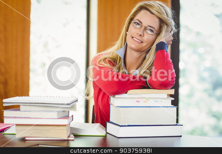 To use this stock image in your creative project, please select the size you need over to the right and click the "Add to Cart" button.
Your downloaded image will come with the Cutcaster watermark removed so don’t worry about the watermark you see on this page. Smiling mature student with stack of books stock photo, Smiling mature student with stack of books in library by Wavebreak Media