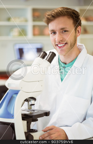 To use this stock image in your creative project, please select the size you need over to the right and click the "Add to Cart" button.
Your downloaded image will come with the Cutcaster watermark removed so don’t worry about the watermark you see on this page. Young scientist working with microscope stock photo, Young scientist working with microscope at the university by Wavebreak Media