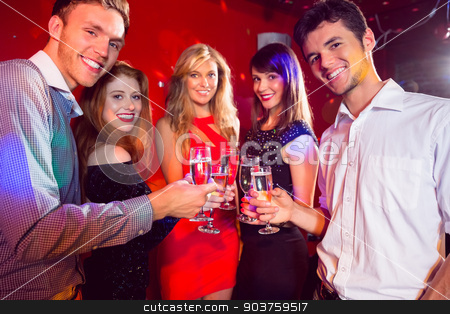 To use this stock image in your creative project, please select the size you need over to the right and click the "Add to Cart" button.
Your downloaded image will come with the Cutcaster watermark removed so don’t worry about the watermark you see on this page. Happy friends on a night out together stock photo, Happy friends on a night out together at the nightclub by Wavebreak Media