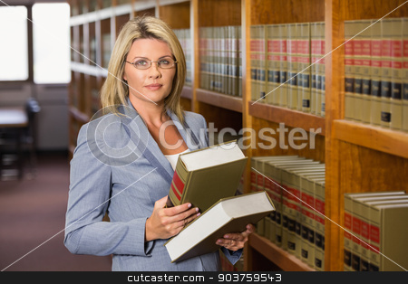 To use this stock image in your creative project, please select the size you need over to the right and click the "Add to Cart" button.
Your downloaded image will come with the Cutcaster watermark removed so don’t worry about the watermark you see on this page. Lawyer holding books in the law library stock photo, Lawyer reading book in the law library at the university by Wavebreak Media