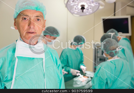 To use this stock image in your creative project, please select the size you need over to the right and click the "Add to Cart" button.
Your downloaded image will come with the Cutcaster watermark removed so don’t worry about the watermark you see on this page. Medical professor looking at camera during fake surgery stock photo, Medical professor looking at camera during fake surgery at the university by Wavebreak Media
