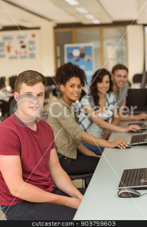 To use this stock image in your creative project, please select the size you need over to the right and click the "Add to Cart" button.
Your downloaded image will come with the Cutcaster watermark removed so don’t worry about the watermark you see on this page. Classmates working in the computer room stock photo, Classmates working in the computer room at the university by Wavebreak Media
