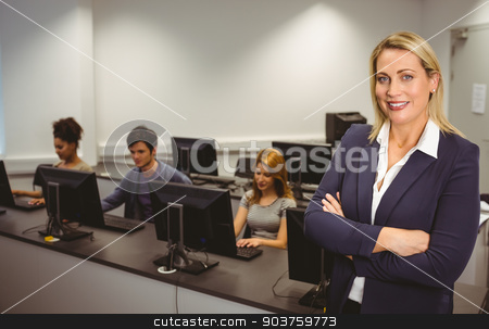 To use this stock image in your creative project, please select the size you need over to the right and click the "Add to Cart" button.
Your downloaded image will come with the Cutcaster watermark removed so don’t worry about the watermark you see on this page. Computer teacher smiling at camera with arms crossed stock photo, Computer teacher smiling at camera with arms crossed at the university by Wavebreak Media