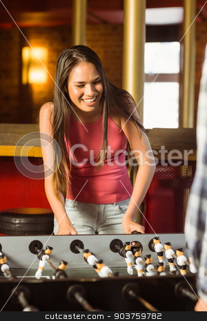 To use this stock image in your creative project, please select the size you need over to the right and click the "Add to Cart" button.
Your downloaded image will come with the Cutcaster watermark removed so don’t worry about the watermark you see on this page. A brunette playing table football stock photo, A brunette playing table football with friends in a bar by Wavebreak Media
