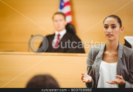To use this stock image in your creative project, please select the size you need over to the right and click the "Add to Cart" button.
Your downloaded image will come with the Cutcaster watermark removed so don’t worry about the watermark you see on this page. Serious lawyer make a closing statement stock photo, Serious lawyer make a closing statement in the court room by Wavebreak Media