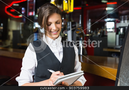 To use this stock image in your creative project, please select the size you need over to the right and click the "Add to Cart" button.
Your downloaded image will come with the Cutcaster watermark removed so don’t worry about the watermark you see on this page. Happy barmaid writing in notepad stock photo, Happy barmaid writing in notepad in a bar by Wavebreak Media