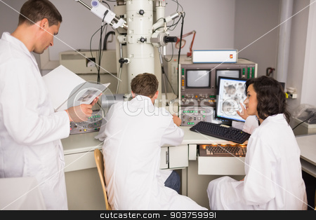 To use this stock image in your creative project, please select the size you need over to the right and click the "Add to Cart" button.
Your downloaded image will come with the Cutcaster watermark removed so don’t worry about the watermark you see on this page. Biochemistry students using large microscope and computer stock photo, Biochemistry students using large microscope and computer at the university by Wavebreak Media
