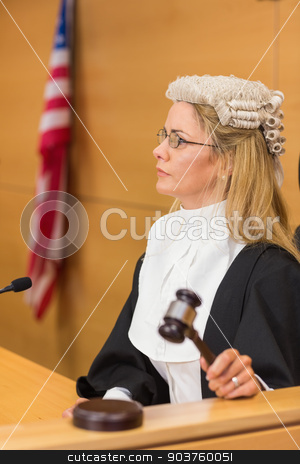 To use this stock image in your creative project, please select the size you need over to the right and click the "Add to Cart" button.
Your downloaded image will come with the Cutcaster watermark removed so don’t worry about the watermark you see on this page. Stern judge sitting and listening stock photo, Stern judge sitting and listening in the court room by Wavebreak Media