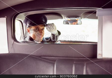 To use this stock image in your creative project, please select the size you need over to the right and click the "Add to Cart" button.
Your downloaded image will come with the Cutcaster watermark removed so don’t worry about the watermark you see on this page. Limousine driver smiling at camera stock photo, Limousine driver smiling at camera through partition in limousine by Wavebreak Media