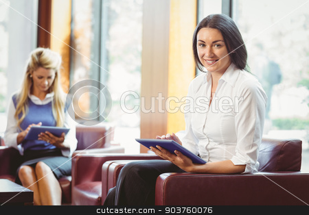 To use this stock image in your creative project, please select the size you need over to the right and click the "Add to Cart" button.
Your downloaded image will come with the Cutcaster watermark removed so don’t worry about the watermark you see on this page. Smiling business colleagues with digital tablet stock photo, Smiling business colleagues with digital tablet in the office by Wavebreak Media
