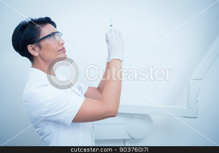 To use this stock image in your creative project, please select the size you need over to the right and click the "Add to Cart" button.
Your downloaded image will come with the Cutcaster watermark removed so don’t worry about the watermark you see on this page. Female dentist in surgical mask holding injection stock photo, Side view of female dentist holding injection by Wavebreak Media