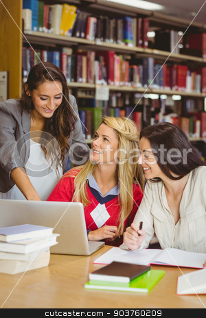 To use this stock image in your creative project, please select the size you need over to the right and click the "Add to Cart" button.
Your downloaded image will come with the Cutcaster watermark removed so don’t worry about the watermark you see on this page. Pretty student showing her classmates something on laptop stock photo, Pretty student showing her classmates something on laptop in library by Wavebreak Media