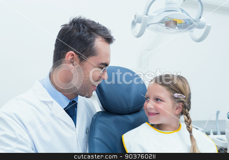 To use this stock image in your creative project, please select the size you need over to the right and click the "Add to Cart" button.
Your downloaded image will come with the Cutcaster watermark removed so don’t worry about the watermark you see on this page. Male dentist examining girls teeth stock photo, Male dentist examining girls teeth in the dentists chair by Wavebreak Media