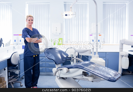To use this stock image in your creative project, please select the size you need over to the right and click the "Add to Cart" button.
Your downloaded image will come with the Cutcaster watermark removed so don’t worry about the watermark you see on this page. Dentist in blue scrubs standing with arms crossed beside chair stock photo, Dentist in blue scrubs standing with arms crossed beside chair at the dental clinic by Wavebreak Media