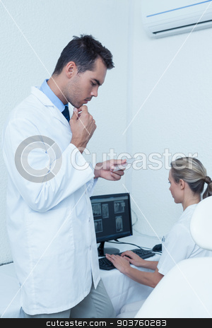 To use this stock image in your creative project, please select the size you need over to the right and click the "Add to Cart" button.
Your downloaded image will come with the Cutcaster watermark removed so don’t worry about the watermark you see on this page. Dentists at work stock photo, Male and female dentists at work by Wavebreak Media