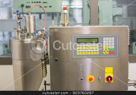 To use this stock image in your creative project, please select the size you need over to the right and click the "Add to Cart" button.
Your downloaded image will come with the Cutcaster watermark removed so don’t worry about the watermark you see on this page. Machine used in medicine making stock photo, Machine used in medicine making at the laboratory by Wavebreak Media