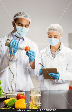 To use this stock image in your creative project, please select the size you need over to the right and click the "Add to Cart" button.
Your downloaded image will come with the Cutcaster watermark removed so don’t worry about the watermark you see on this page. Food scientist using device on tomato stock photo, Food scientist using device on tomato at the university by Wavebreak Media