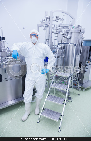To use this stock image in your creative project, please select the size you need over to the right and click the "Add to Cart" button.
Your downloaded image will come with the Cutcaster watermark removed so don’t worry about the watermark you see on this page. Scientist in protective suit leaning against machine stock photo, Scientist in protective suit leaning against machine in the factory by Wavebreak Media