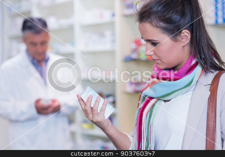 To use this stock image in your creative project, please select the size you need over to the right and click the "Add to Cart" button.
Your downloaded image will come with the Cutcaster watermark removed so don’t worry about the watermark you see on this page. Customer holding a drug box stock photo, Customer holding a drug box in the pharmacy by Wavebreak Media