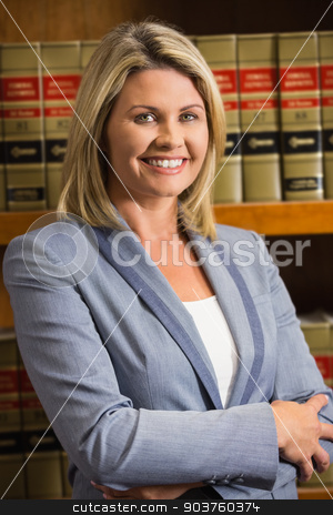 To use this stock image in your creative project, please select the size you need over to the right and click the "Add to Cart" button.
Your downloaded image will come with the Cutcaster watermark removed so don’t worry about the watermark you see on this page. Lawyer smiling at camera in law library stock photo, Lawyer smiling at camera in law library at the university by Wavebreak Media
