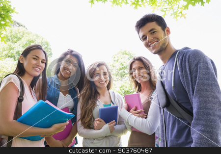 To use this stock image in your creative project, please select the size you need over to the right and click the "Add to Cart" button.
Your downloaded image will come with the Cutcaster watermark removed so don’t worry about the watermark you see on this page. Happy students smiling at camera outside on campus stock photo, Happy students smiling at camera outside on campus at the university by Wavebreak Media