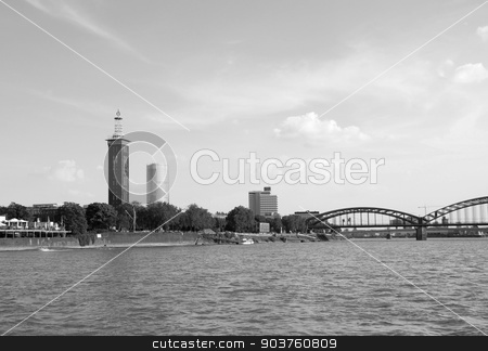 To use this stock image in your creative project, please select the size you need over to the right and click the "Add to Cart" button.
Your downloaded image will come with the Cutcaster watermark removed so don’t worry about the watermark you see on this page. Architecture of Cologne seen from the Rhine river stock photo, The Messeturm (Fair Tower), Triangle Tower and Hohenzollernbruecke (Hohenzollern Bridge) seen from the Rhine in Cologne, Germany - monochrome processing by Sarah Marchant