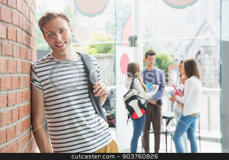 To use this stock image in your creative project, please select the size you need over to the right and click the "Add to Cart" button.
Your downloaded image will come with the Cutcaster watermark removed so don’t worry about the watermark you see on this page. Handsome student smiling at camera stock photo, Handsome student smiling at camera at the university by Wavebreak Media