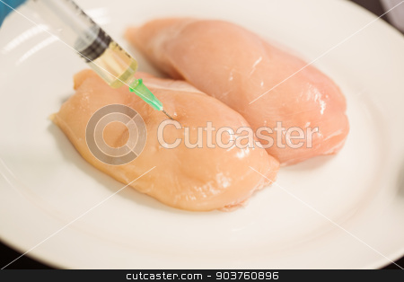 To use this stock image in your creative project, please select the size you need over to the right and click the "Add to Cart" button.
Your downloaded image will come with the Cutcaster watermark removed so don’t worry about the watermark you see on this page. Food scientist injecting raw chicken stock photo, Food scientist injecting raw chicken at the university by Wavebreak Media