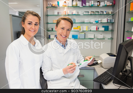 To use this stock image in your creative project, please select the size you need over to the right and click the "Add to Cart" button.
Your downloaded image will come with the Cutcaster watermark removed so don’t worry about the watermark you see on this page. Team of pharmacists looking at prescription stock photo, Team of pharmacists looking at prescription at the hospital pharmacy by Wavebreak Media