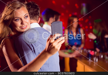 To use this stock image in your creative project, please select the size you need over to the right and click the "Add to Cart" button.
Your downloaded image will come with the Cutcaster watermark removed so don’t worry about the watermark you see on this page. Cute couple slow dancing together stock photo, Cute couple slow dancing together at the nightclub by Wavebreak Media