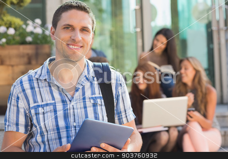 To use this stock image in your creative project, please select the size you need over to the right and click the "Add to Cart" button.
Your downloaded image will come with the Cutcaster watermark removed so don’t worry about the watermark you see on this page. Happy student using his tablet pc on campus stock photo, Happy student using his tablet pc on campus at the university by Wavebreak Media