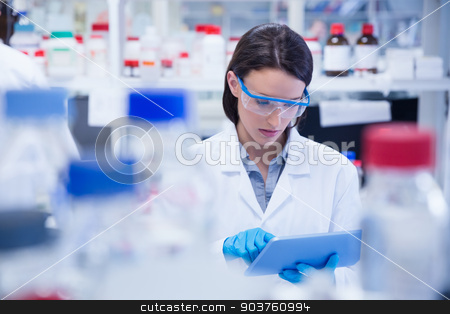 To use this stock image in your creative project, please select the size you need over to the right and click the "Add to Cart" button.
Your downloaded image will come with the Cutcaster watermark removed so don’t worry about the watermark you see on this page. Chemist wearing safety glasses and using tablet pc stock photo, Chemist wearing safety glasses and using tablet pc in lab by Wavebreak Media