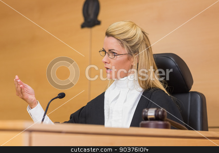 To use this stock image in your creative project, please select the size you need over to the right and click the "Add to Cart" button.
Your downloaded image will come with the Cutcaster watermark removed so don’t worry about the watermark you see on this page. Stern judge speaking to the court stock photo, Stern judge speaking to the court in the court room by Wavebreak Media