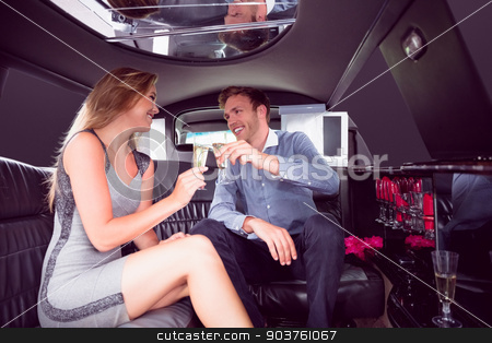 To use this stock image in your creative project, please select the size you need over to the right and click the "Add to Cart" button.
Your downloaded image will come with the Cutcaster watermark removed so don’t worry about the watermark you see on this page. Happy couple drinking champagne in limousine stock photo, Happy couple drinking champagne in limousine on a night out by Wavebreak Media