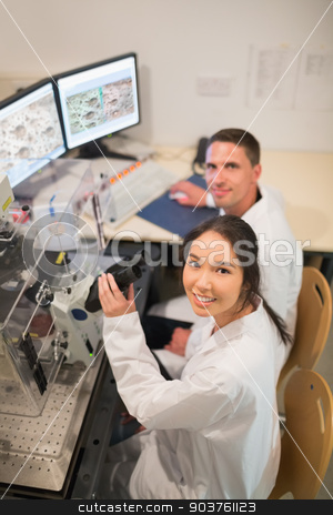 To use this stock image in your creative project, please select the size you need over to the right and click the "Add to Cart" button.
Your downloaded image will come with the Cutcaster watermark removed so don’t worry about the watermark you see on this page. Biochemistry students using large microscope and computer stock photo, Biochemistry students using large microscope and computer at the university by Wavebreak Media