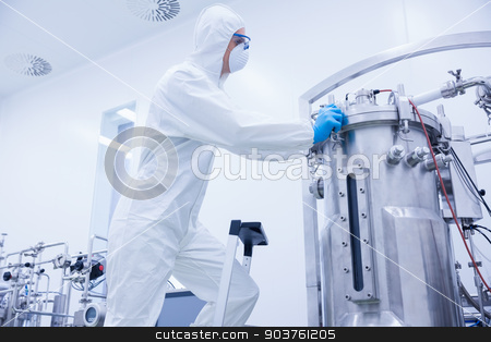 To use this stock image in your creative project, please select the size you need over to the right and click the "Add to Cart" button.
Your downloaded image will come with the Cutcaster watermark removed so don’t worry about the watermark you see on this page. Scientist in protective suit standing on ladder stock photo, Scientist in protective suit standing on ladder in the factory by Wavebreak Media